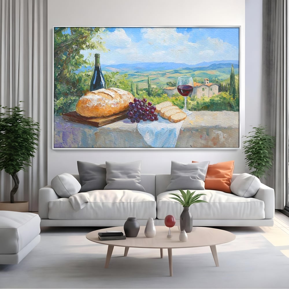 Tablou canvas cu tablou canvas cu natura moarta si peisaj toscan, in rama de aluminiu argintiu, pe perete intr-un living